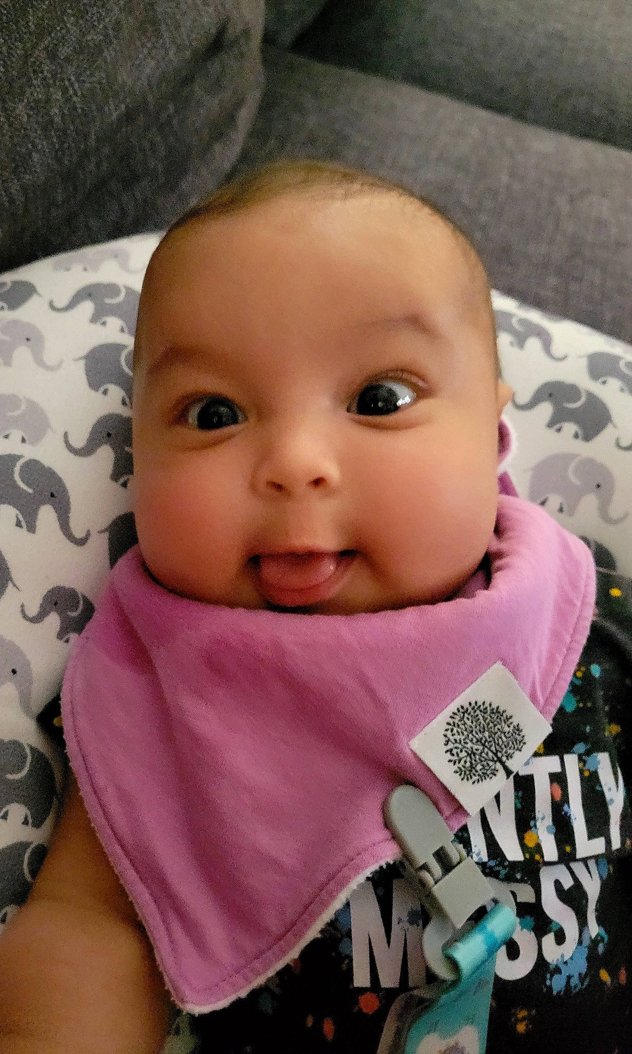 Ayla is registered to the contest to win money with this photo: baby, baby_toddler_clothing, cheek, chin, eye, eyebrow, eyelash, face, facial_expression, forehead, happy, head, iris, lip, mouth, nose, person, pink, skin, sleeve