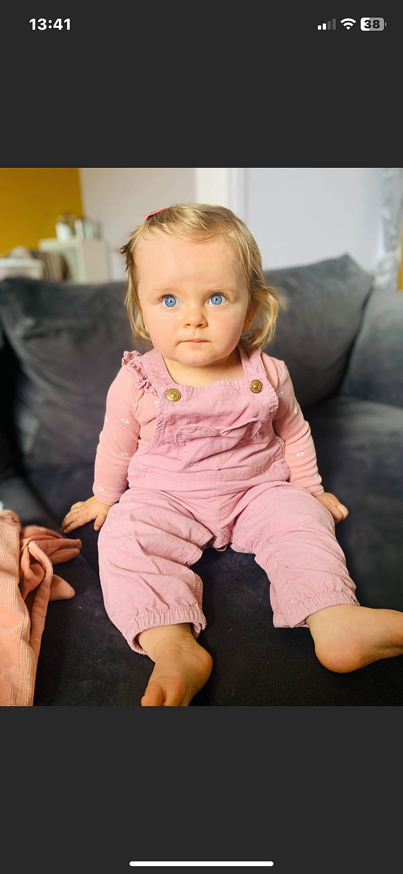 Ellie Rose participe au concours pour gagner de l'argent avec cette photo : baby_toddler_clothing, barefoot, cheek, comfort, couch, finger, flash_photography, flooring, foot, fun, gesture, hand, happy, head, human_leg, person, skin, sleeve, t_shirt, thigh