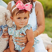Kinley joined the competition — help win amazing prizes! toddler, child, woman, adult, dog, pet, bow, headband, flower_pattern, bracelet, ring, smile, outdoor, nature, greenery, summer, family, portrait, person, happy