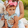 toddler, child, woman, adult, dog, pet, bow, headband, flower_pattern, bracelet, ring, smile, outdoor, nature, greenery, summer, family, portrait, person, happy