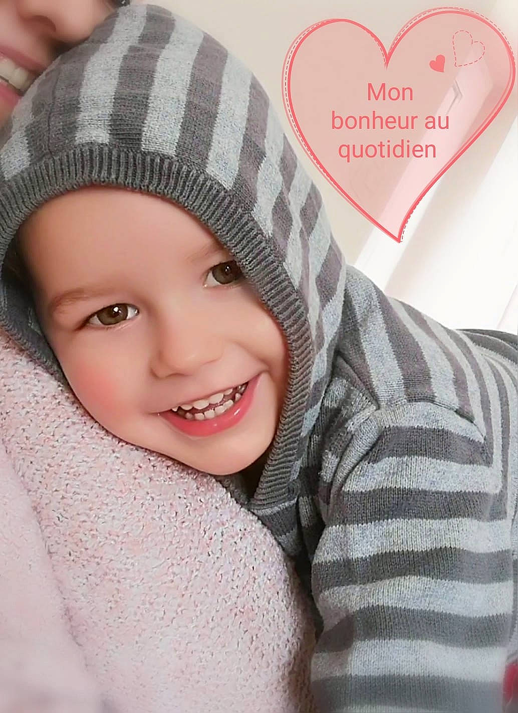 Valentin a rejoint le concours — aidez-le/la à gagner de superbes lots ! baby, beanie, beauty, cap, cheek, child, eye, face, forehead, head, headgear, headwear, joy, knit_cap, lip, nose, outerwear, person, pink, skin