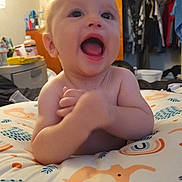 Keane joined the competition — help win amazing prizes! animal, baby, bed, bedroom, bird, closet, clothing, cupboard, face, furniture, happy, head, indoors, laughing, person, photography, portrait, quilt, room, t_shirt