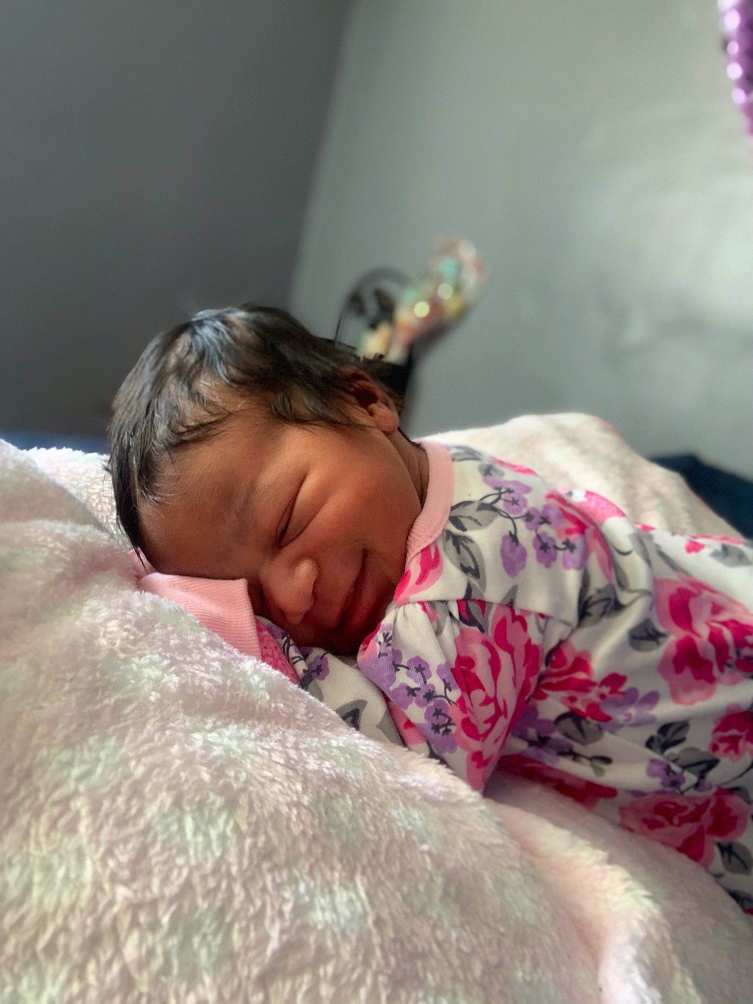 Armoni is registered to the contest to win money with this photo: bed, bed_sheet, bedding, bedroom, bedtime, child, comfort, couch, flooring, fur, happy, linens, magenta, mattress, nap, person, room, skin, sleep, smile