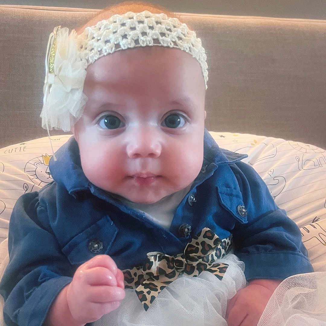 Ava joined the competition — help win amazing prizes! accessories, appliance, baby, bonnet, cap, clothing, coat, costume, device, dress, electricaldevice, face, hat, head, jacket, pants, person, photography, portrait, refrigerator