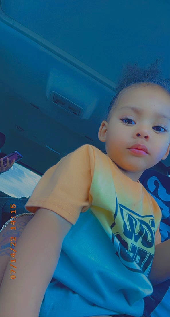 Kaliyah is registered to the contest to win money with this photo: automotive_design, baby, black_hair, chest, cool, doll, electric_blue, family_car, fun, happy, human_leg, leisure, mouth, pattern, person, shoulder, sitting, t_shirt, toddler, trunk