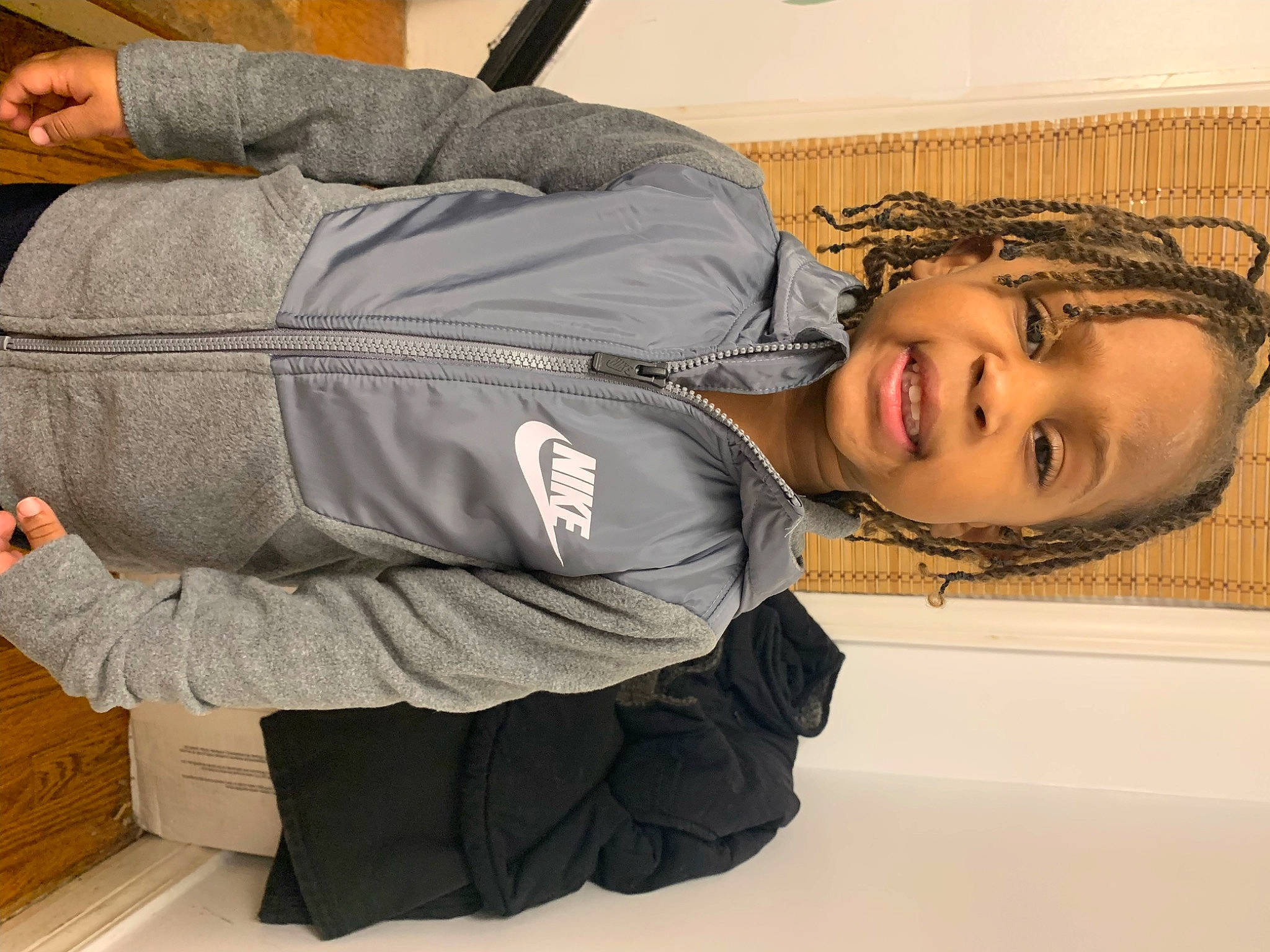 Apollo is registered to the contest to win money with this photo: comfort, denim, elbow, eyelash, happy, jacket, knee, outerwear, person, sitting, sleeve, smile, sportswear, travel, wrist