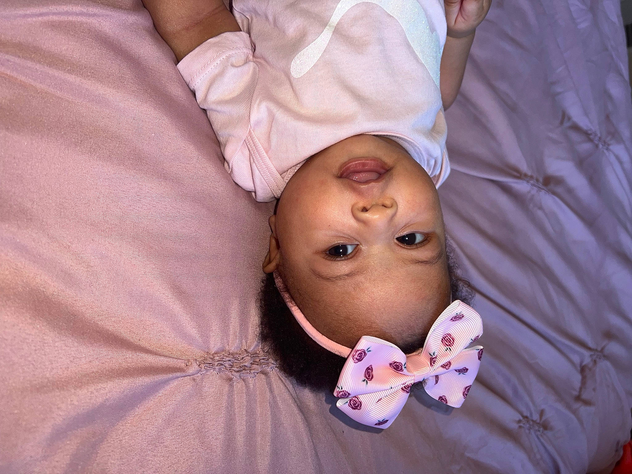 Hila is registered to the contest to win money with this photo: baby, cheek, comfort, eyebrow, finger, fun, gesture, glasses, happy, lip, mouth, nail, neck, nose, person, pink, purple, skin, thumb, toddler