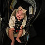 baby, car_seat, smile, headband, infant, straps, sitting, cute, indoors, child, person, seat, happy, clothing, face, safety, cute_baby, baby_girl, infant_seat, young_child