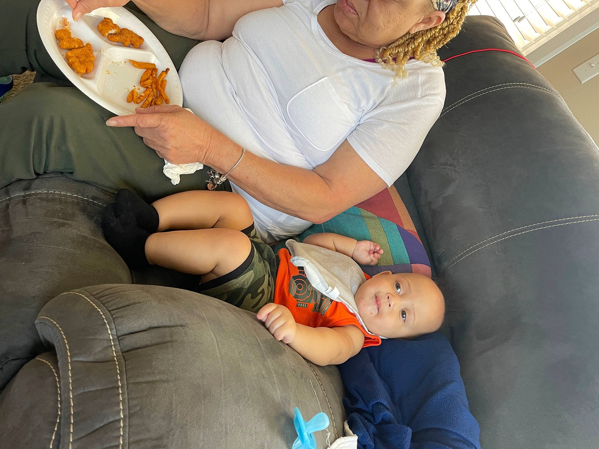 Jalen joined the competition — help win amazing prizes! arm, baby, comfort, elbow, finger, hand, hat, human_body, human_leg, joint, knee, lap, leg, leisure, muscle, person, sitting, tableware, thigh, toddler