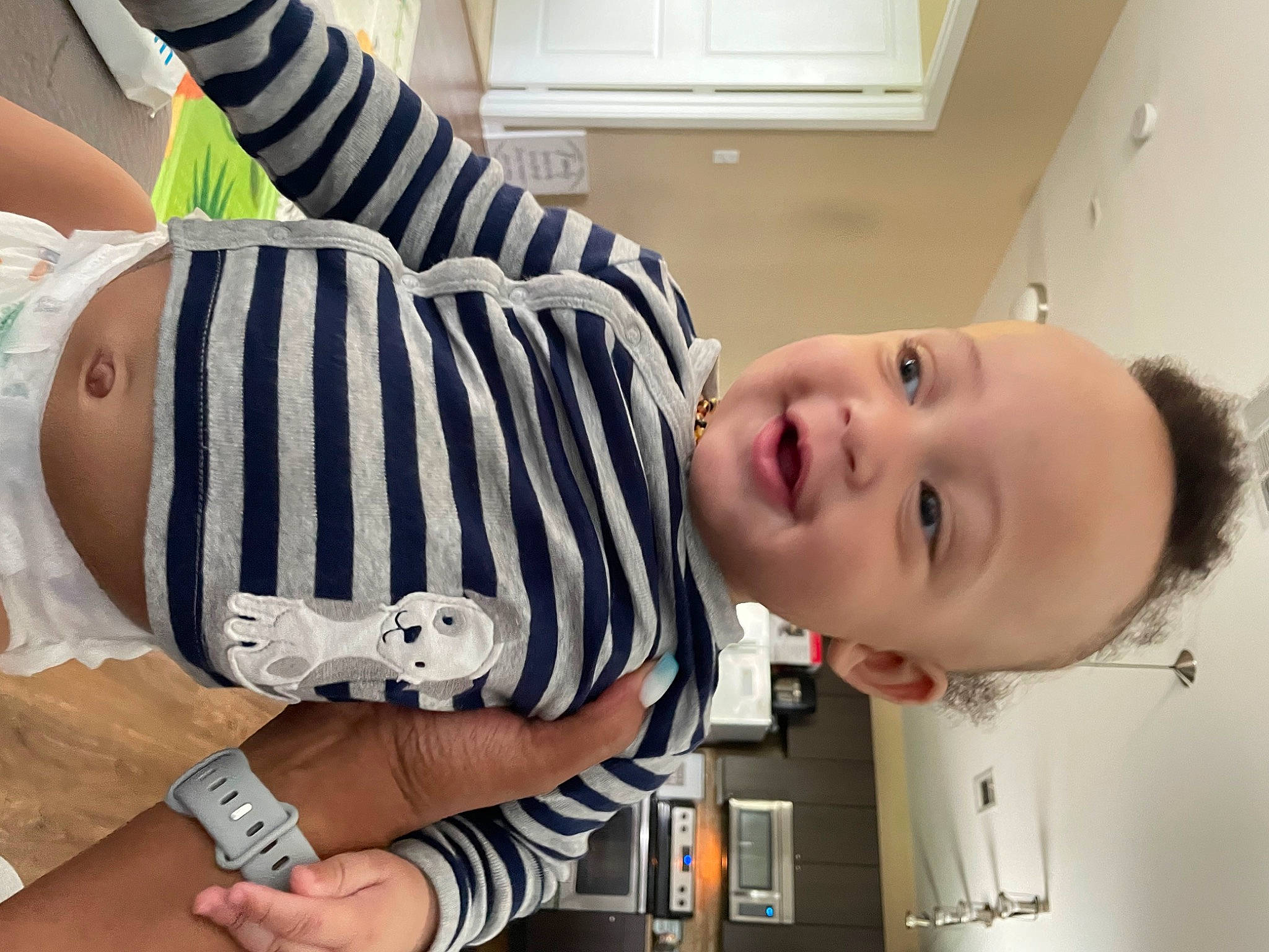 Jalen is registered to the contest to win money with this photo: arm, baby, baby_toddler_clothing, cheek, eyelash, facial_expression, finger, hairstyle, happy, human_body, jaw, mouth, muscle, neck, person, product, shoulder, sleeve, smile, toddler