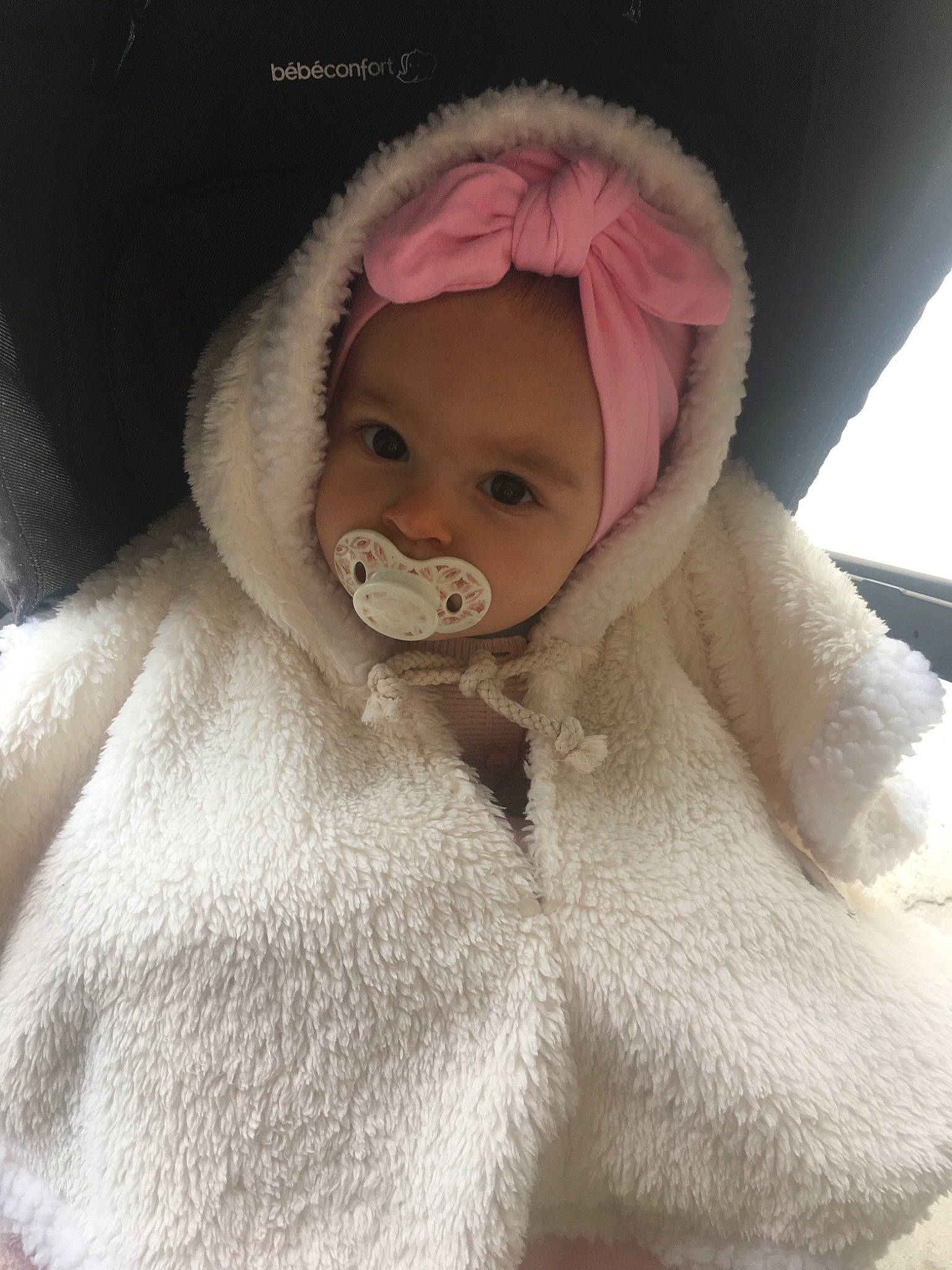 Calie participe au concours pour gagner de l'argent avec cette photo : baby, cap, cheek, child, ear, fur, fur_clothing, head, headgear, headwear, lip, nose, person, pink, skin, textile, toddler, toy, wool