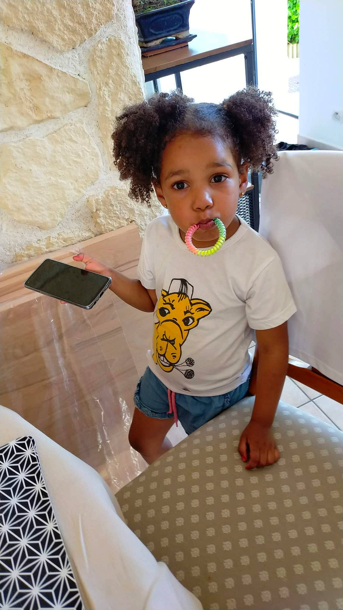 Naomie participe au concours pour gagner de l'argent avec cette photo : baby, baby_toddler_clothing, black, chair, child, face, facial_expression, flooring, fun, happy, human, joint, person, shirt, shorts, shoulder, skin, sleeve, t_shirt, toddler