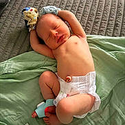 Sebastian is registered to the contest to win money with this photo: newborn, baby, sleeping, diaper, mittens, blanket, bed, face, infant, skin, cute, relaxed, resting, cozy, soft, toddler, child, healthcare, home, peaceful