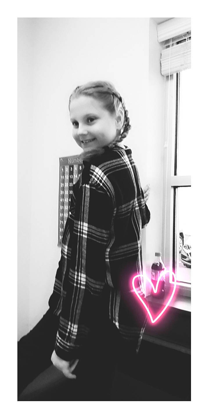 Tanisha is registered to the contest to win money with this photo: black_and_white, blazer, collar, dress, face, flash_photography, hair, hairstyle, happy, joy, neck, pattern, person, plaid, shoulder, sleeve, smile, street_fashion, style, tartan