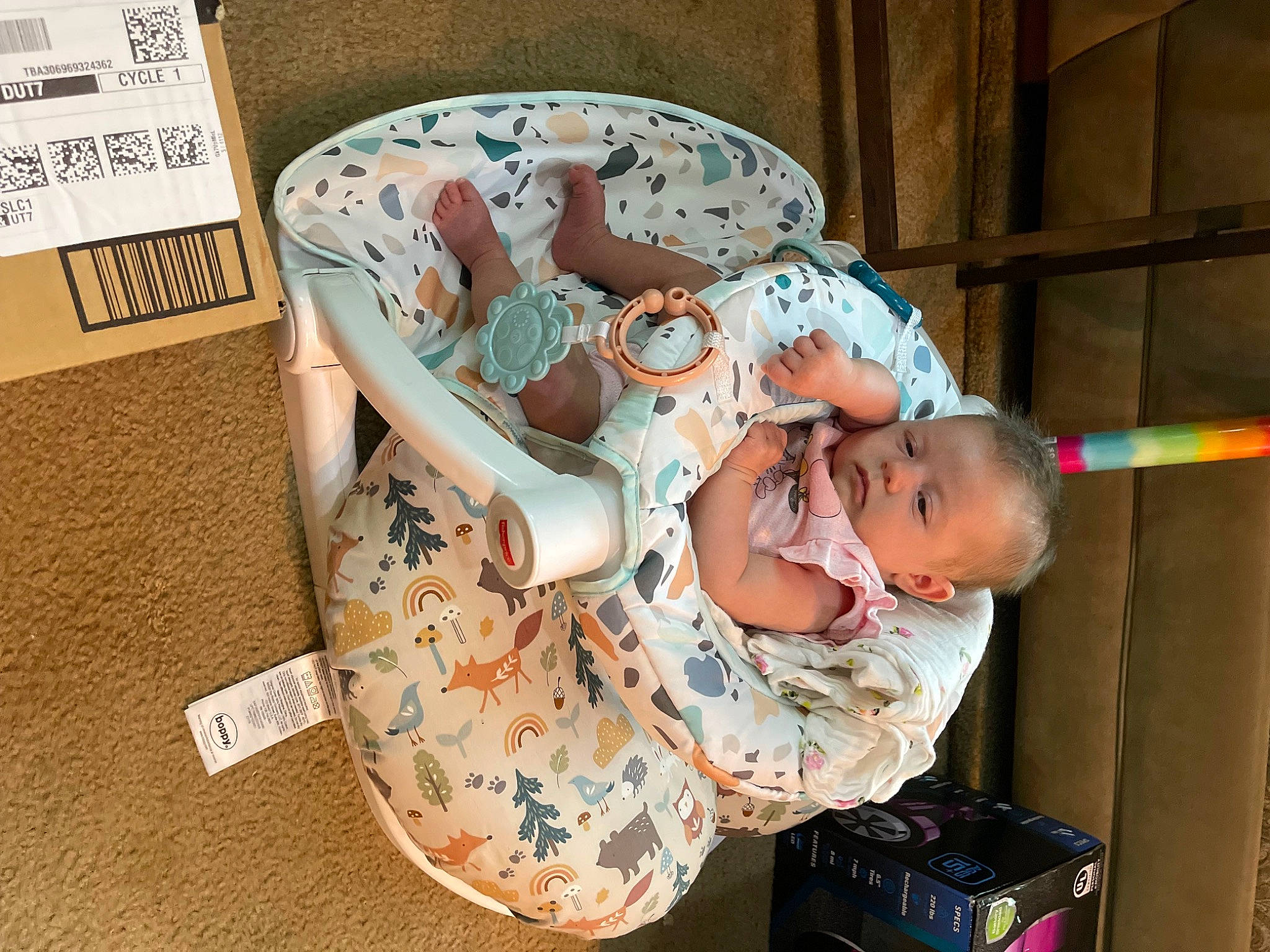 Annalise is registered to the contest to win money with this photo: art, baby, baby_products, baby_toddler_clothing, bag, briefcase, child, comfort, font, happy, hat, luggage_and_bags, pattern, person, room, sitting, thigh, toddler
