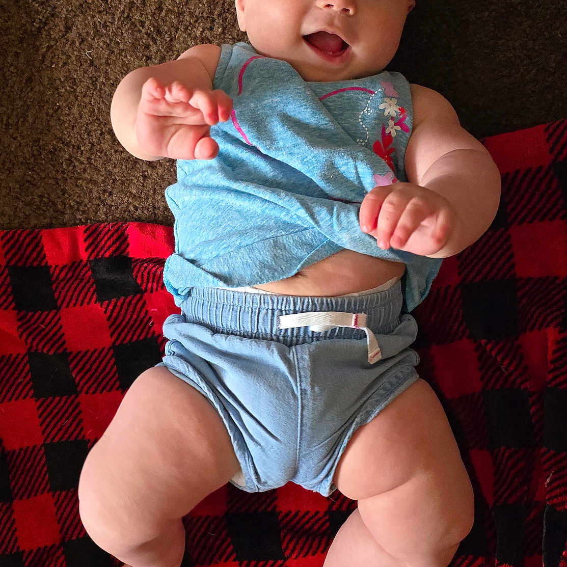 Aurora is registered to the contest to win money with this photo: accessories, baby, bodypart, cap, clothing, couch, diaper, face, finger, furniture, hand, hat, head, newborn, pants, person, photography, portrait, shorts, sitting