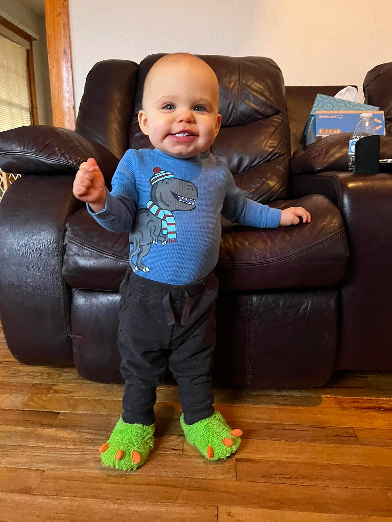 Russell joined the competition — help win amazing prizes! baby, baby_toddler_clothing, child, comfort, eye, floor, flooring, fun, hairstyle, hardwood, joy, laminate_flooring, living_room, mammal, person, sitting, sleeve, smile, toddler, varnish