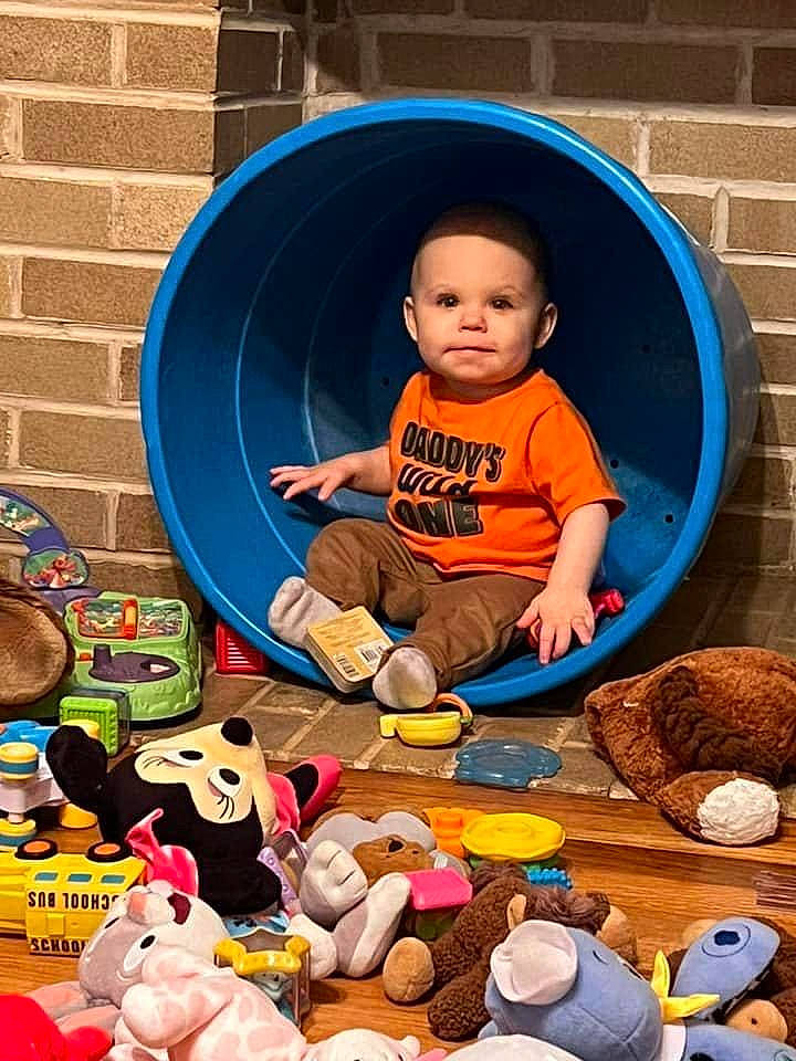 Russell joined the competition — help win amazing prizes! baby, baby_toddler_clothing, baby_toys, blue, brick, brickwork, chair, child, fun, hat, headgear, orange, people, person, play, product, room, stuffed_toy, toddler, toy