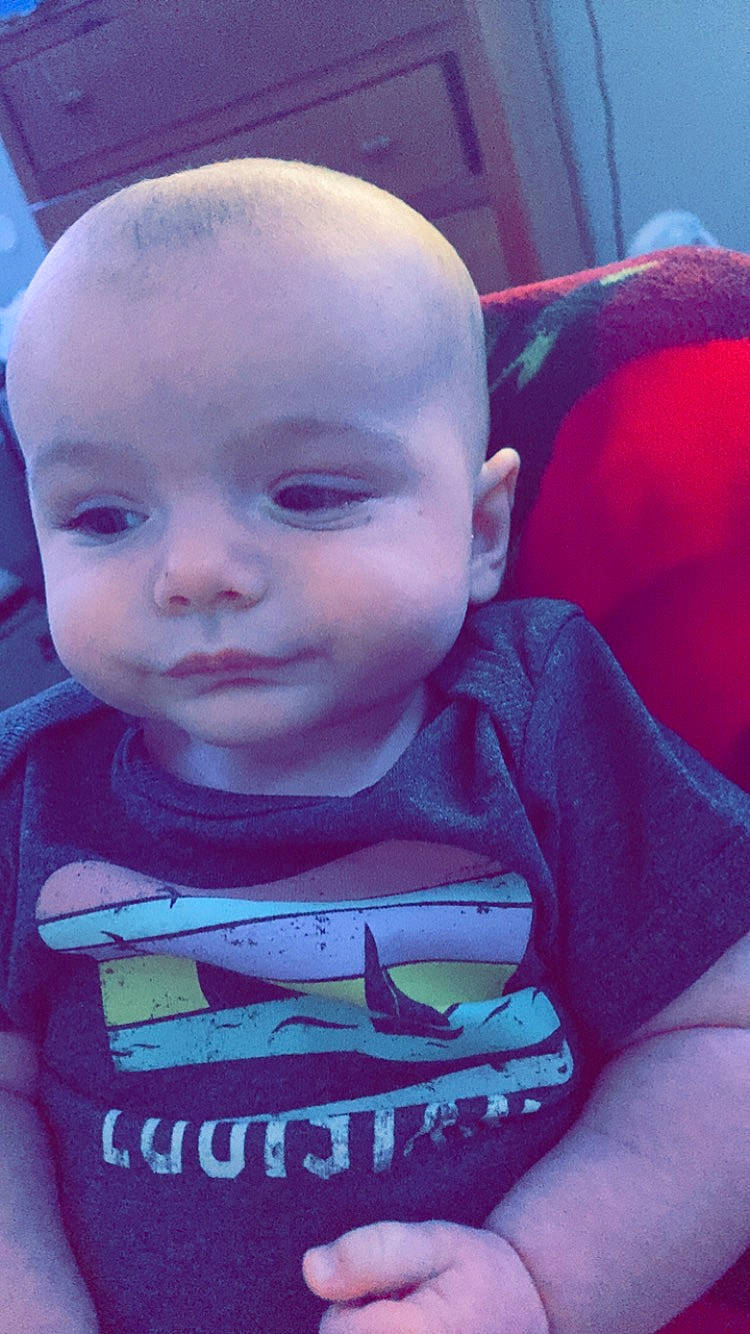 Cayden is registered to the contest to win money with this photo: baby, baby_toddler_clothing, cheek, chin, cool, eye, eyebrow, facial_expression, forehead, hairstyle, happy, iris, lip, mouth, neck, nose, person, pink, purple, skin