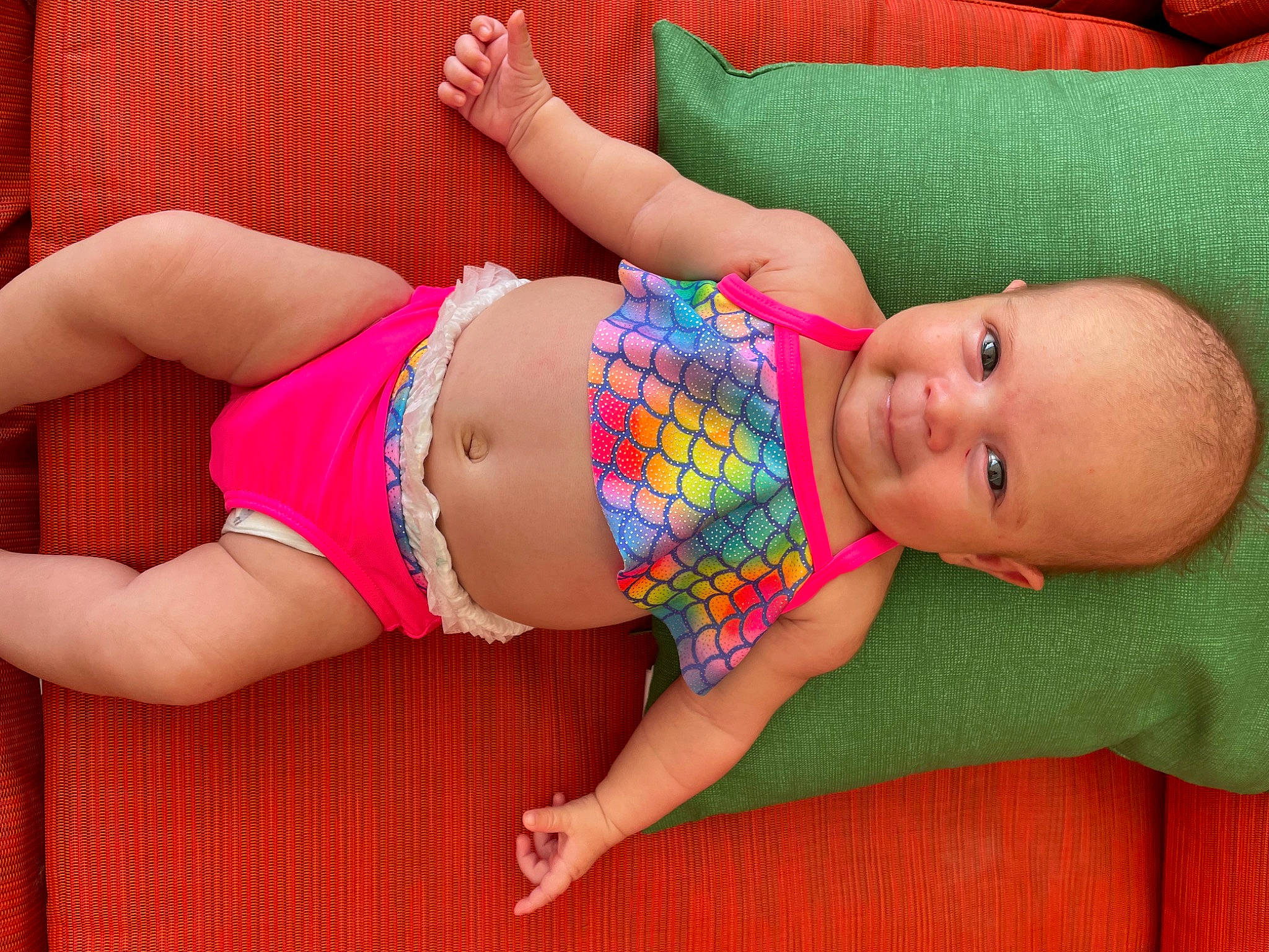 Brielle is registered to the contest to win money with this photo: arm, baby_toddler_clothing, brassiere, chest, finger, glasses, hand, human_body, joint, knee, leg, person, pink, skin, smile, stomach, swimsuit_bottom, swimsuit_top, thigh, trunk