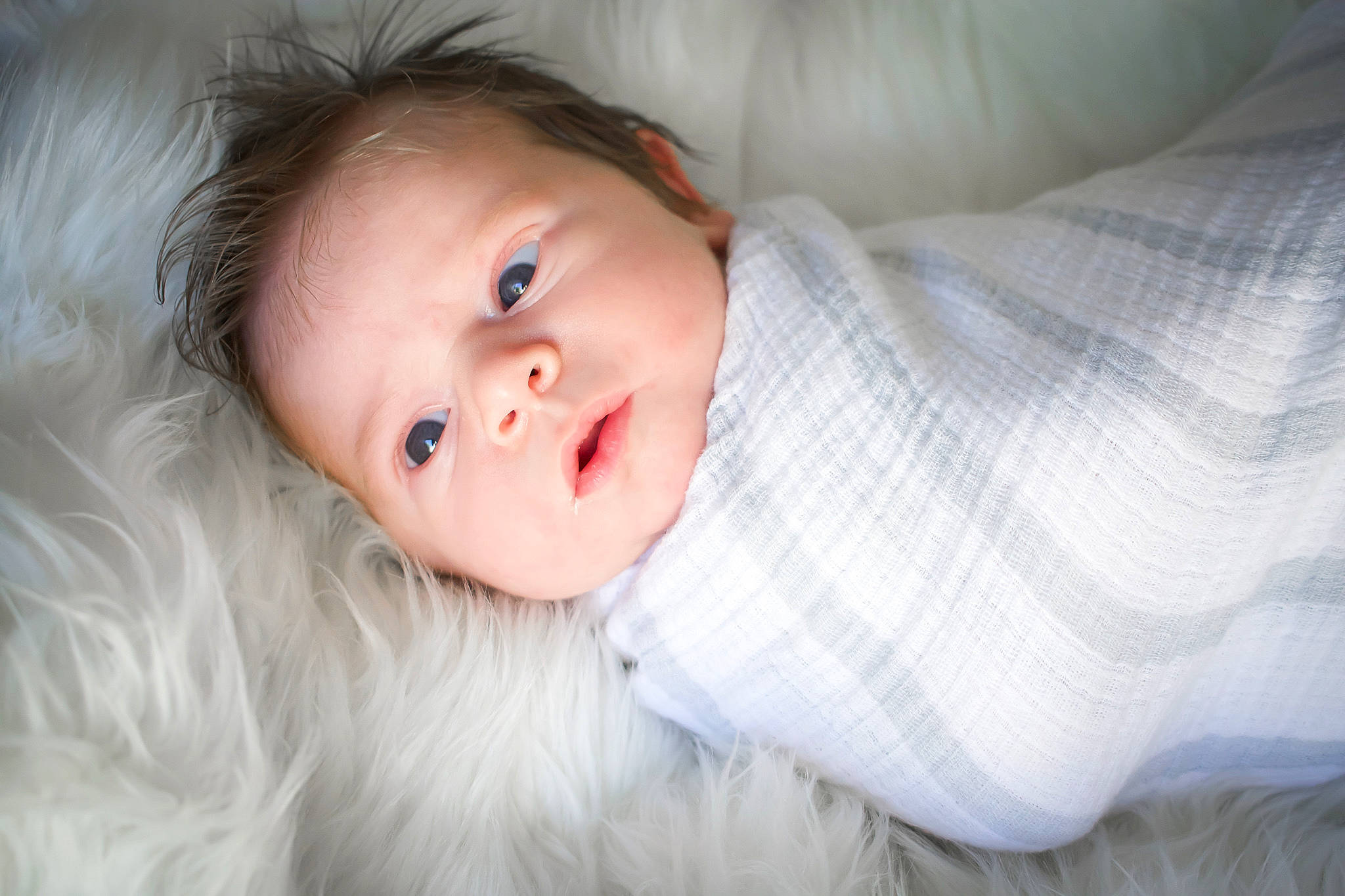 Jennifer is registered to the contest to win money with this photo: baby, baby_toddler_clothing, cheek, child, collar, comfort, eyebrow, eyelash, flash_photography, fur, happy, iris, lip, natural_material, nose, person, portrait_photography, skin, sleeve, smile