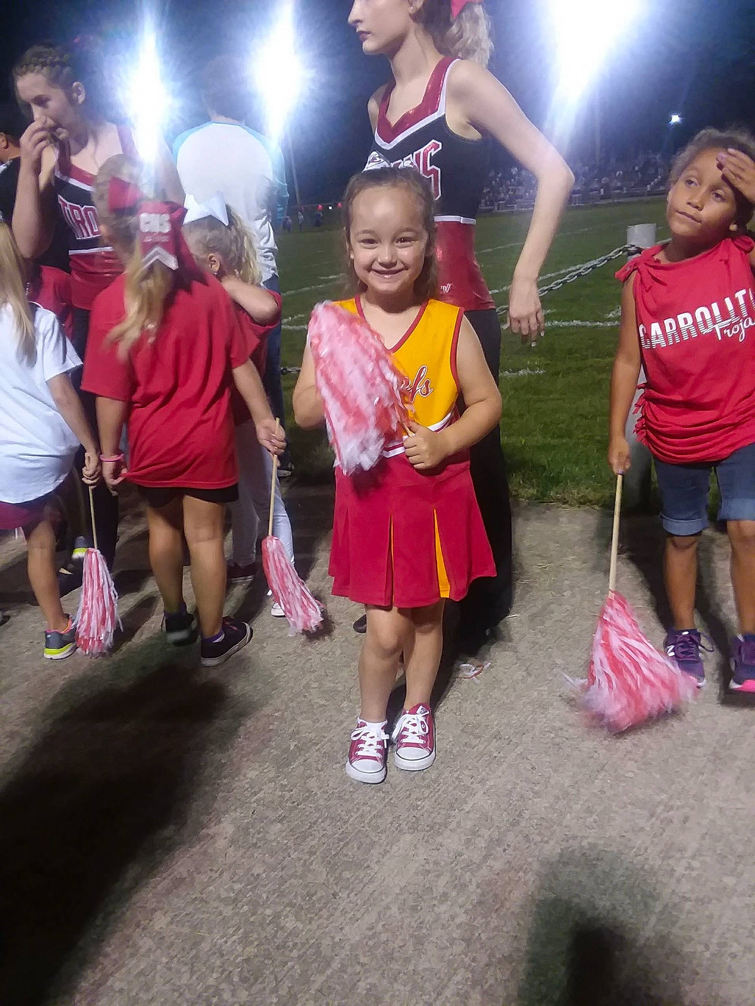 Konner is registered to the contest to win money with this photo: cheering, child, event, friendship, fun, happy, headwear, joy, leisure, party, performance, person, pink, recreation, smile, style, thigh, vacation, youth