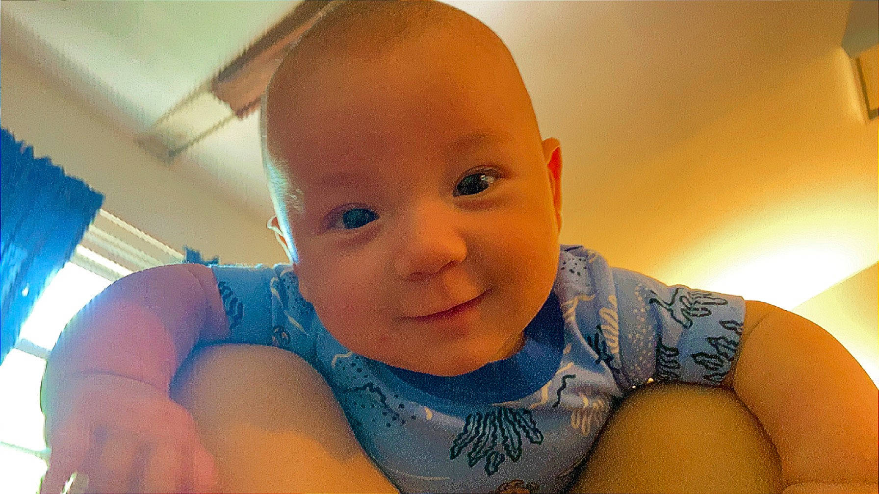 Ian Andy is registered to the contest to win money with this photo: baby, baby_toddler_clothing, cheek, chest, chin, eyebrow, finger, flooring, fun, happy, iris, mouth, neck, nose, person, skin, smile, stomach, toddler, trunk