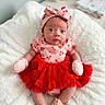 adorable, baby, blanket, bow, child, cozy, cute, headband, indoors, infant, mittens, newborn, pink_clothing, plush_toys, portrait, red_tutu, seated, socks, soft_texture, wide_eyes