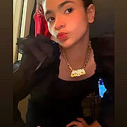 Aniya joined the competition — help win amazing prizes! person, girl, selfie, portrait, pout, necklace, jewelry, black_clothing, hands_on_hips, indoors, closet, hanging_clothes, soft_light, warm_tone, teen, face, brown_eyes, updo_hair, pose, casual