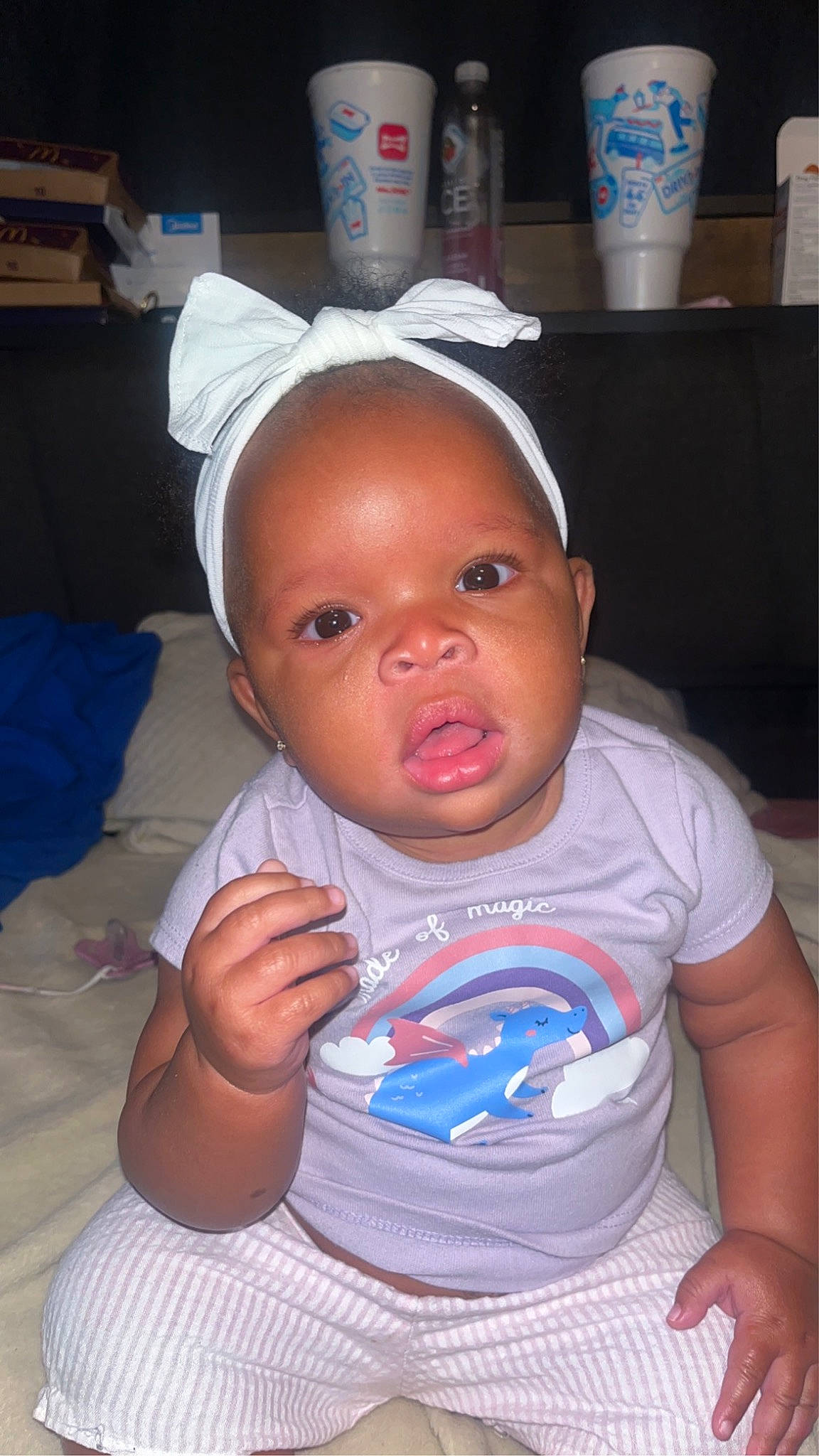 Laylani is registered to the contest to win money with this photo: baby, baby_toddler_clothing, blue, cap, cheek, child, chin, ear, eyebrow, eyelash, forehead, happy, iris, lip, mouth, nose, person, skin, t_shirt, tin_can