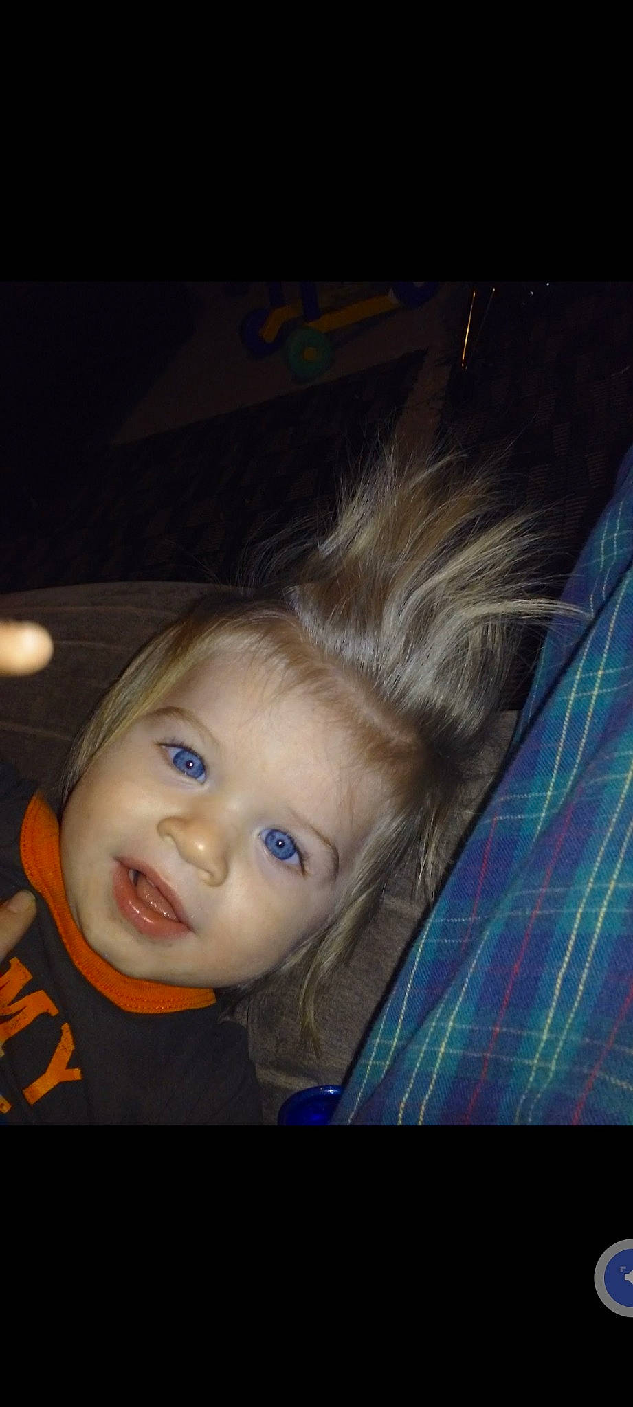 Chase is registered to the contest to win money with this photo: baby, blond, brown_hair, cheek, child, darkness, ear, electric_blue, eyelash, face, flash_photography, fun, happy, iris, lip, nose, person, smile, space, tartan