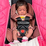 Luna joined the competition — help win amazing prizes! baby, car_seat, pink, infant, child, seat_belt, safety, clothing, newborn, cute, person, fabric, soft, sock, baby_girl, portrait, indoors, small, wrapped, resting
