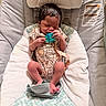 Luna joined the competition — help win amazing prizes! newborn, baby, pacifier, infant, baby_bouncer, sleeping, soft, plush, seat, clothing, pattern, cute, small, resting, indoors, child, peaceful, baby_girl, baby_boy, comfort