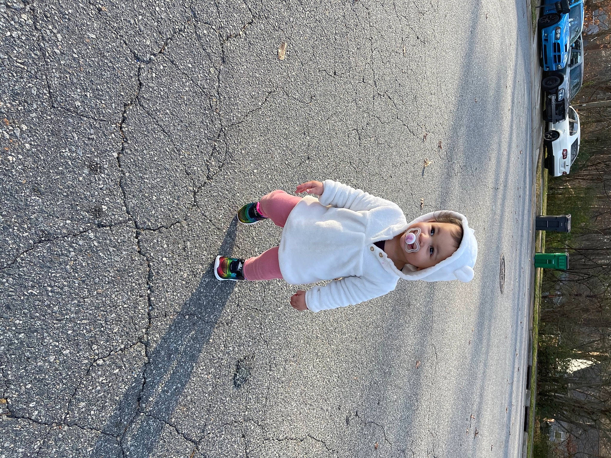 Andromeda is registered to the contest to win money with this photo: ankle, asphalt, concrete, headwear, person, road_surface, road_trip, sidewalk, street, street_fashion, tar, walking_shoe