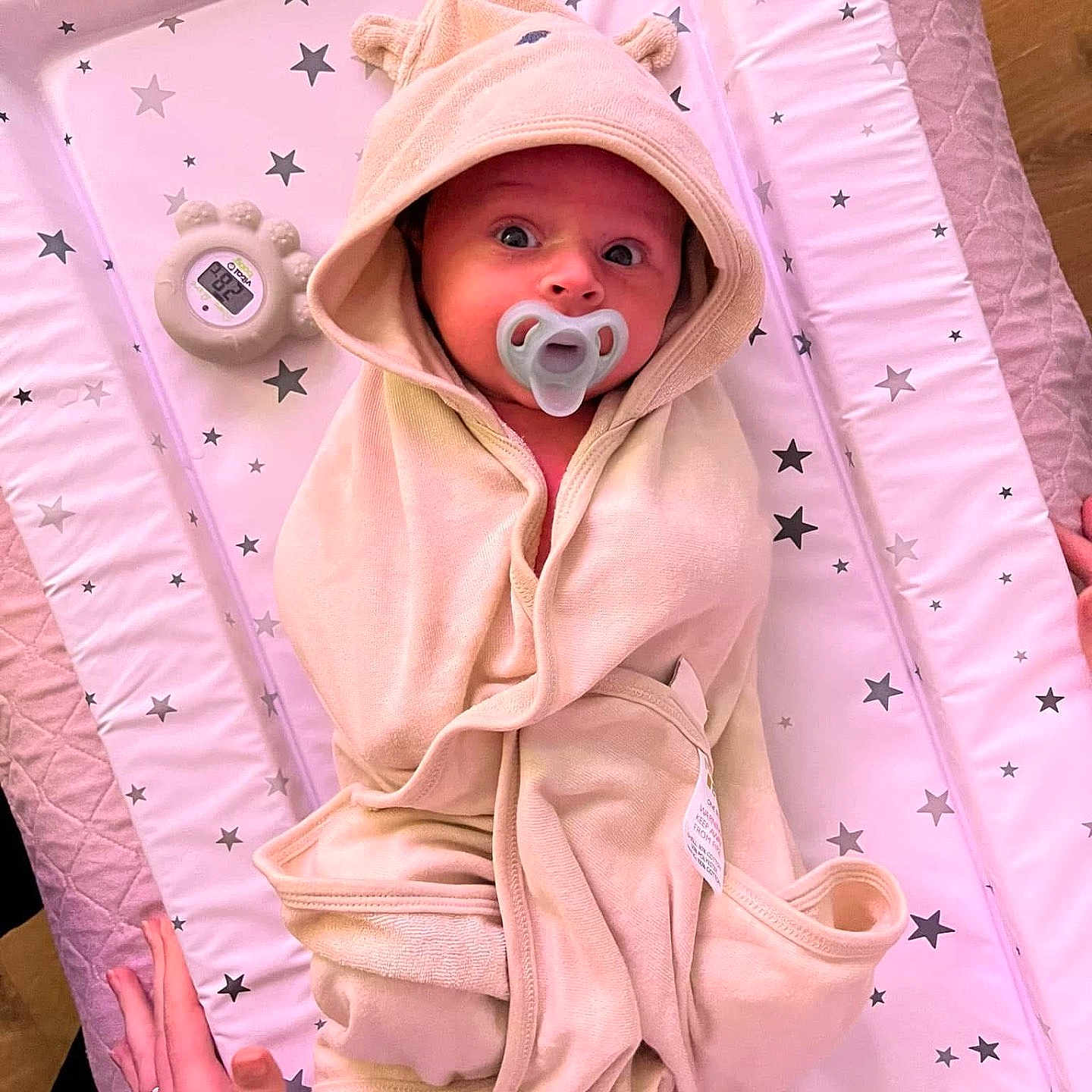 Teddie is registered to the contest to win money with this photo: accessories, baby, blanket, crib, face, furniture, head, infantbed, jewelry, person, ring