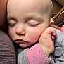 Riley joined the competition — help win amazing prizes! baby, sleeping, closeup, face, hand, pink_cuff, gray_clothing, soft_texture, resting, peaceful, infant, child, cute, eyelashes, skin, cheek, indoors, comfort, relaxation, portrait