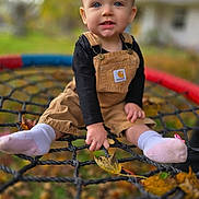 Riley joined the competition — help win amazing prizes! toddler, child, outdoor, swing, rope_net, autumn, leaves, overalls, pink_socks, smiling, blue_eyes, baby, playground, fall, nature, cute, portrait, seasonal, young_child, happy