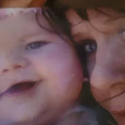 Delta is registered to the contest to win money with this photo: baby, child, face, adult, closeup, portrait, smile, hair, skin, cheek, eyes, nose, mouth, expression, intimate, warm, person, head, human, blur