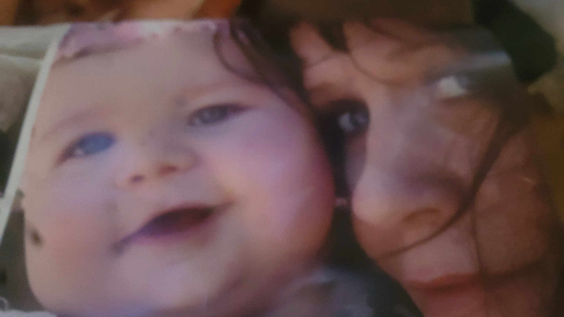 Delta is registered to the contest to win money with this photo: baby, child, face, adult, closeup, portrait, smile, hair, skin, cheek, eyes, nose, mouth, expression, intimate, warm, person, head, human, blur