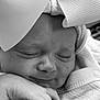 adorable, baby, black_and_white, bow, child, closeup, clothing, cozy, cute, face, hand, headwear, infant, newborn, peaceful, portrait, resting, sleeping, soft, toddler