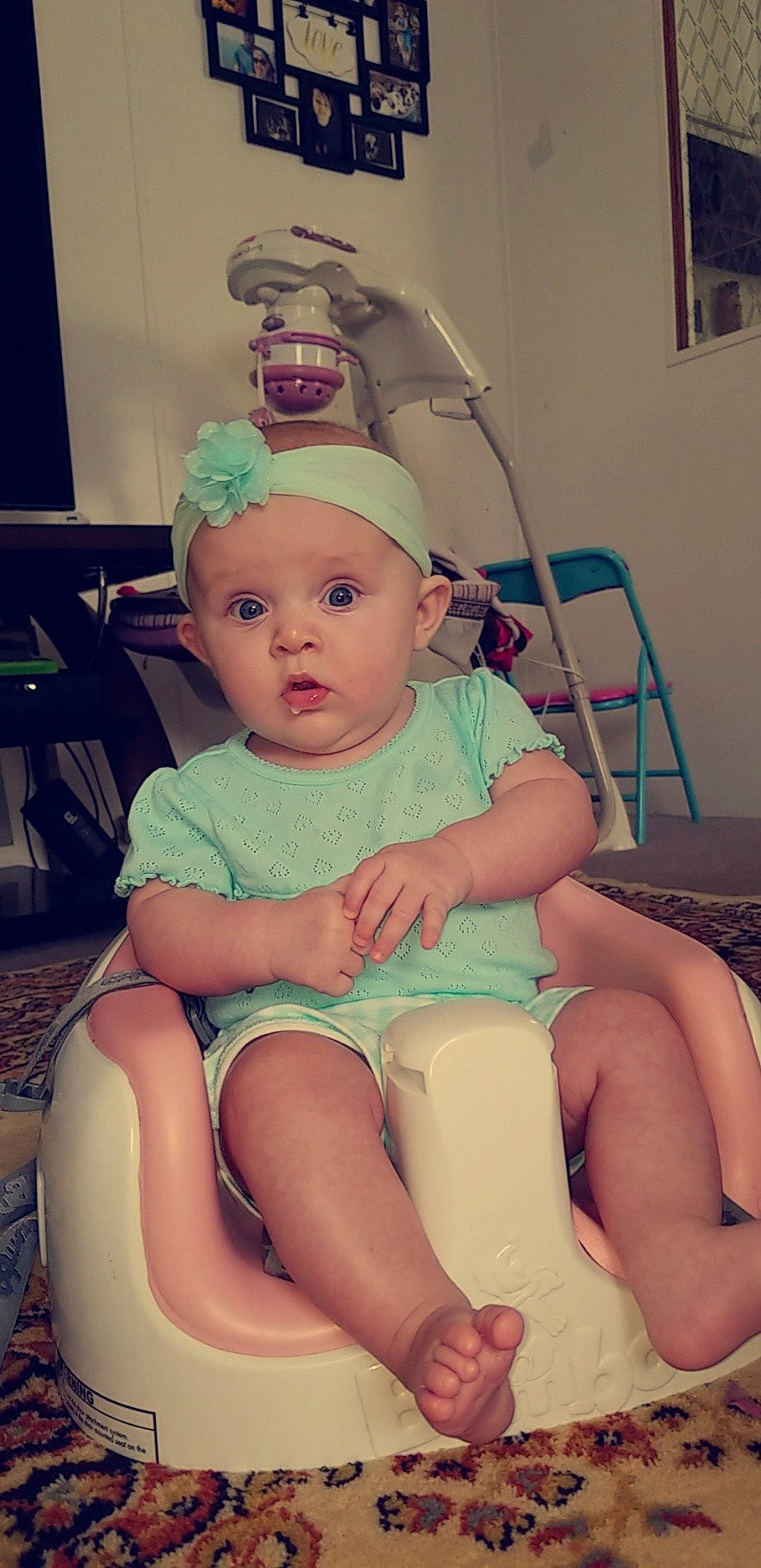 Westlyn joined the competition — help win amazing prizes! arm, cheek, child, day, eye, finger, fun, girl, hand, headgear, human_hair_color, infant, leg, mouth, organ, person, pink, product, sitting, skin