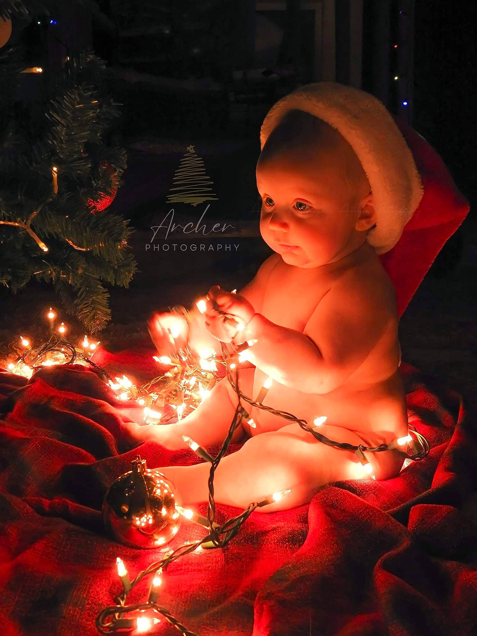 Rhydian joined the competition — help win amazing prizes! art, baby, carmine, christmas_decoration, christmas_ornament, conifer, darkness, event, flash_photography, flesh, heat, holiday, holiday_ornament, interior_design, night, ornament, person, sitting, still_life_photography, tradition