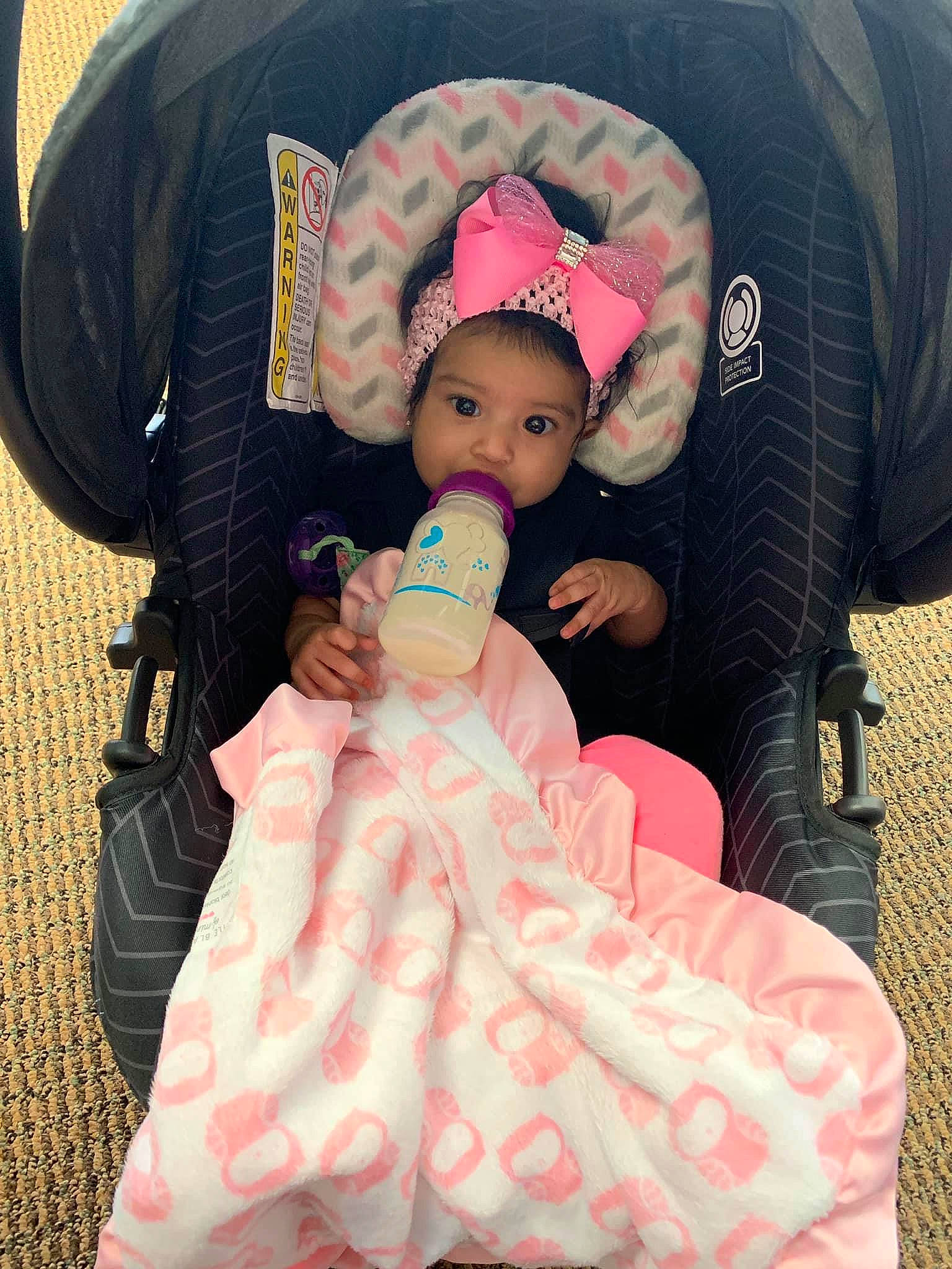 Jaylene is registered to the contest to win money with this photo: baby, baby_products, baby_toddler_clothing, car_seat, child, daughter, hair_accessory, headgear, outerwear, person, pink, product, style, toddler