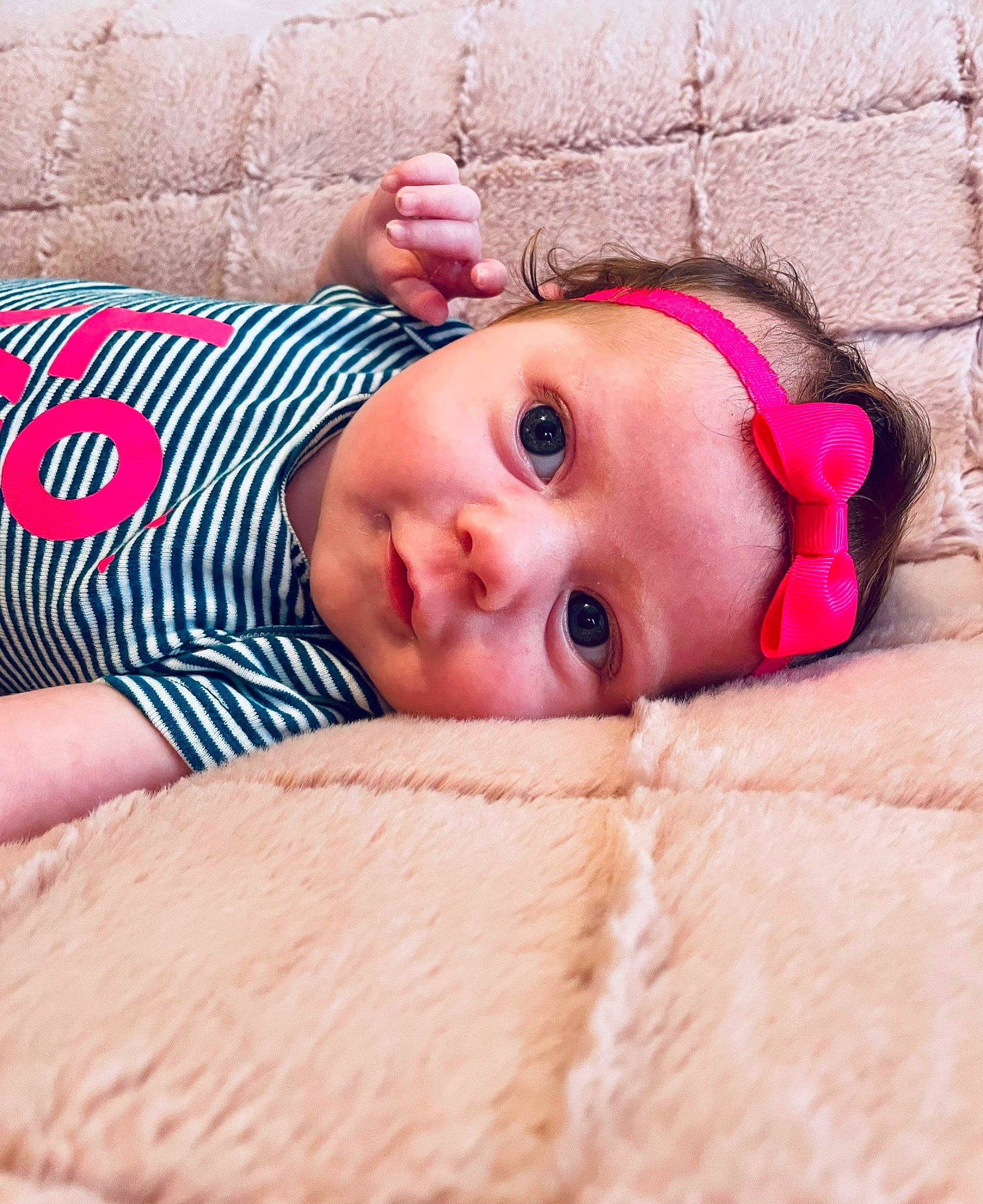 Rosalee is registered to the contest to win money with this photo: baby, baby_toddler_clothing, cheek, chin, comfort, eye, eyebrow, eyelash, face, head, headgear, headwear, iris, lip, mouth, muscle, neck, nose, person, pink