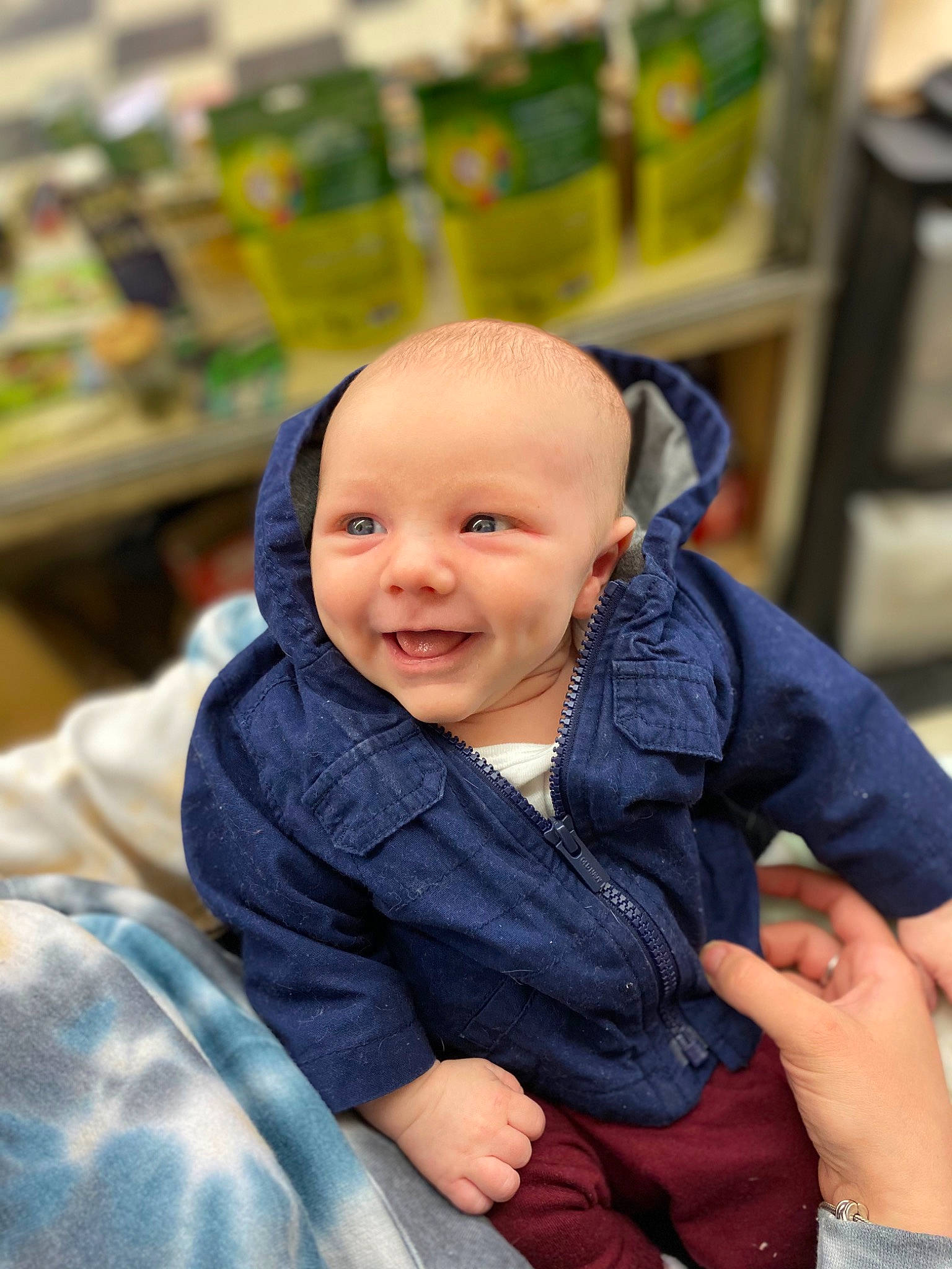 Lincoln joined the competition — help win amazing prizes! baby, baby_carriage, baby_products, baby_toddler_clothing, cheek, child, comfort, electric_blue, fun, happy, joy, leisure, outerwear, person, sitting, skin, sleeve, smile, thumb, toddler