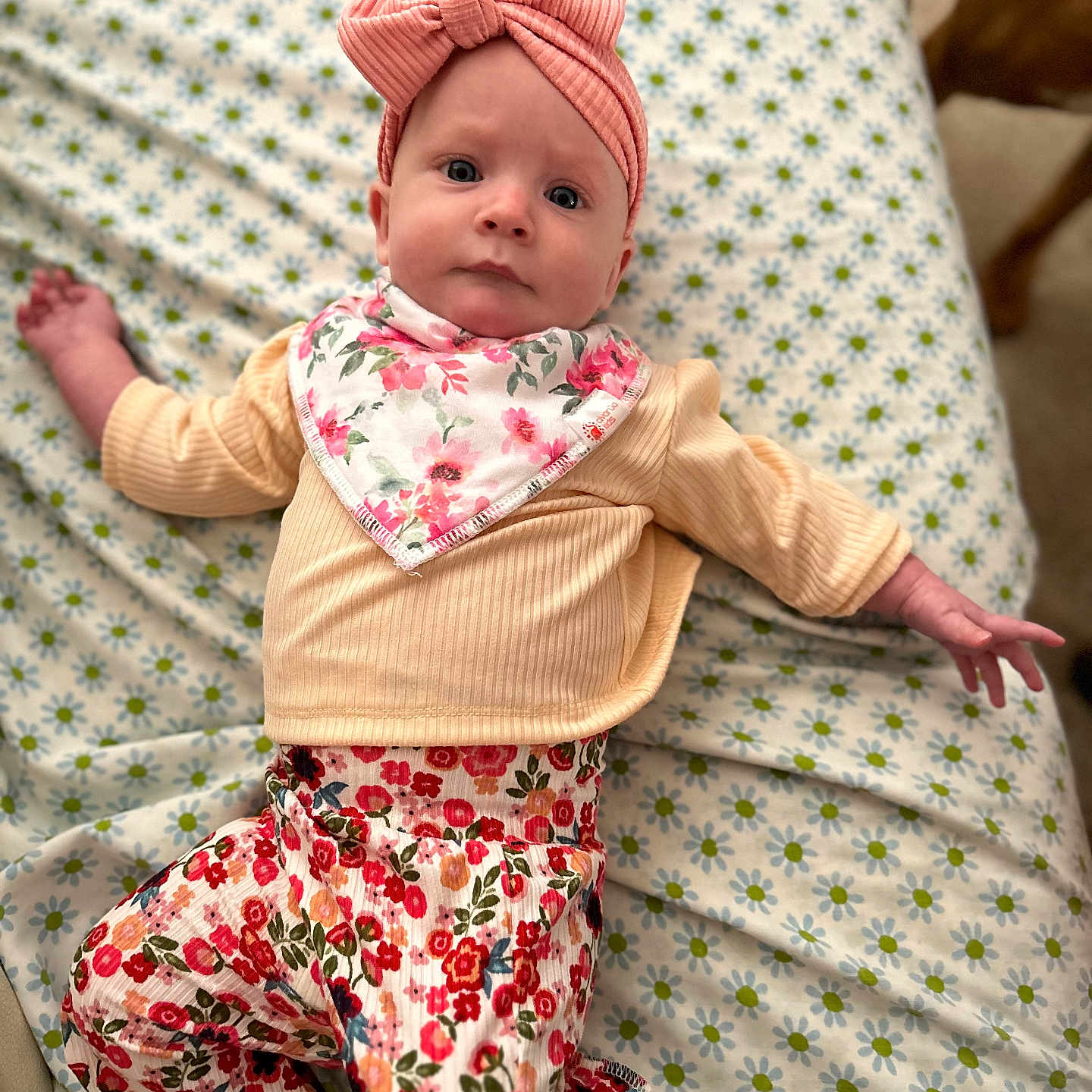 Lillian is registered to the contest to win money with this photo: baby, bed, blanket, bonnet, cap, clothing, couch, cushion, face, furniture, hat, head, homedecor, newborn, pants, person, photography, portrait, quilt, sitting