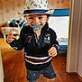 toddler, child, hat, pacifier, smiling, indoor, wooden_floor, shorts, navy_shirt, baby, cute, happy, walking, person, home, flooring, clothing, portrait, playful, young_child