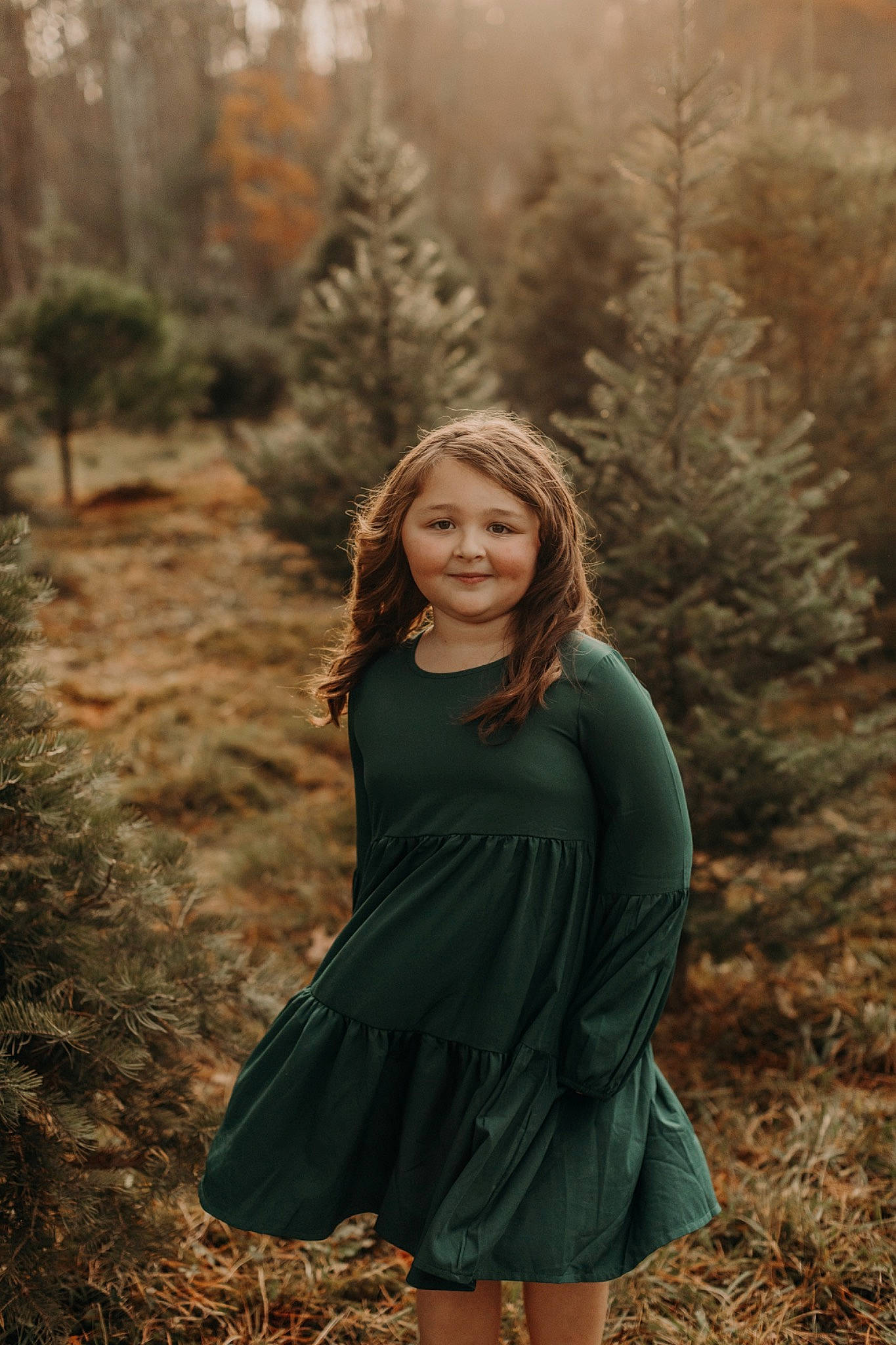 Donna is registered to the contest to win money with this photo: branch, dress, eye, face, facial_expression, fawn, flash_photography, grass, hairstyle, happy, human, joy, leaf, people_in_nature, person, plant, shoulder, smile, sunlight, tree