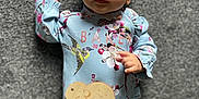 Romi-Dalton joined the competition — help win amazing prizes! 3_months, adorable, baby, bird_design, blue_clothing, carpet, child, closeup, curious_expression, cute, floral_pattern, hair_bow, indoor, infant, lying_down, onesie, portrait, small_hands, soft_texture, wooden_sign