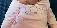Romi-Dalton joined the competition — help win amazing prizes! baby, infant, pink_clothing, headband, bow, cute, sitting, child, portrait, indoors, soft_texture, ribbed_fabric, long_sleeves, pants, closeup, expression, face, person, young_child, comfortable